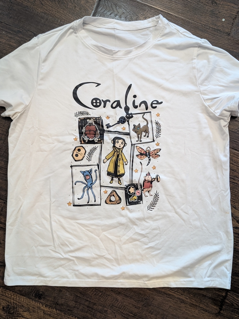 Coraline Graphic White Short‑Sleeve Tee